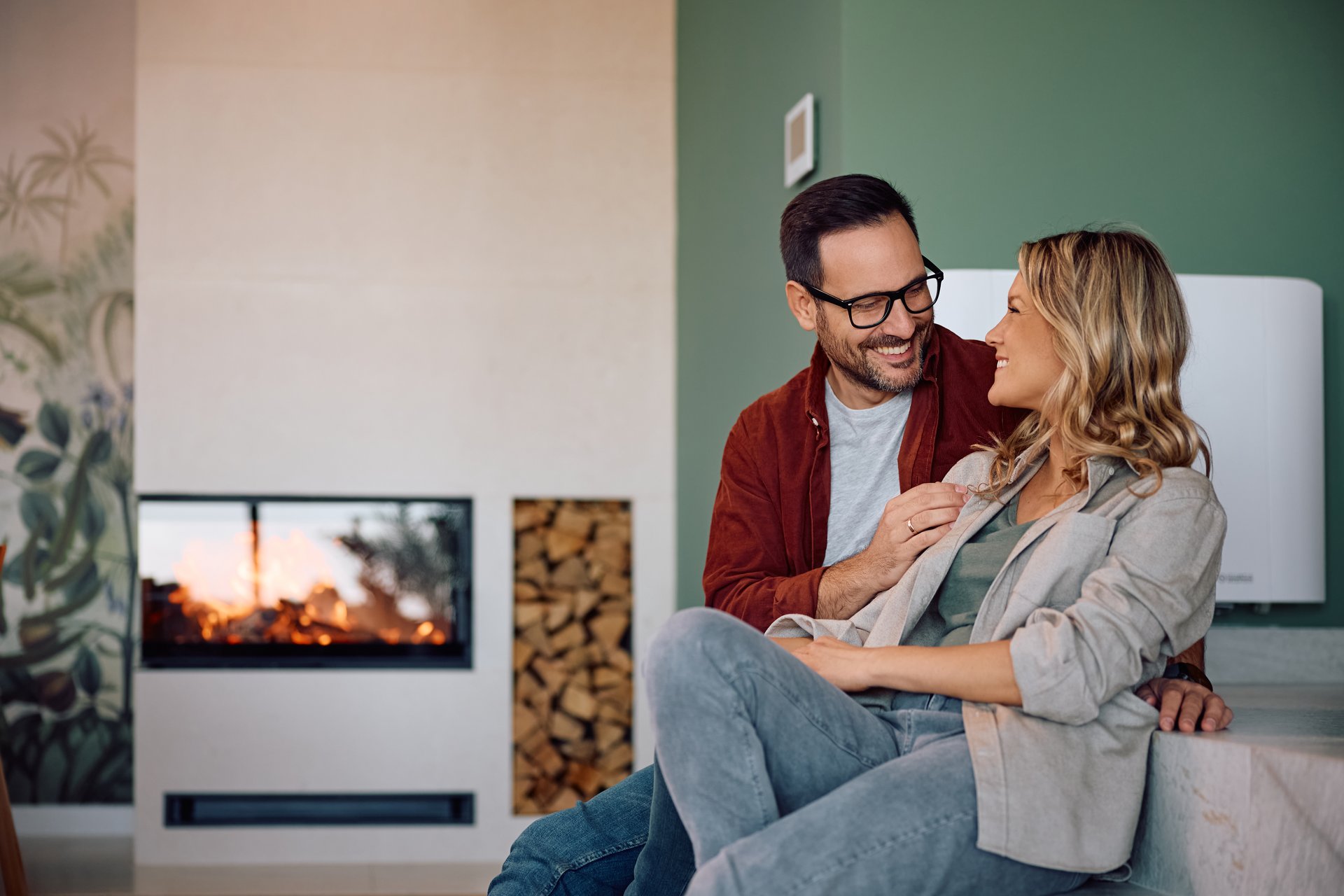 Couple relaxing in new home